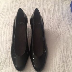 Stuart Weitzman patent leather black pumps